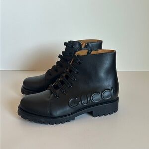 Gucci Black Leather Embossed Logo Lace-Up Ankle Boots